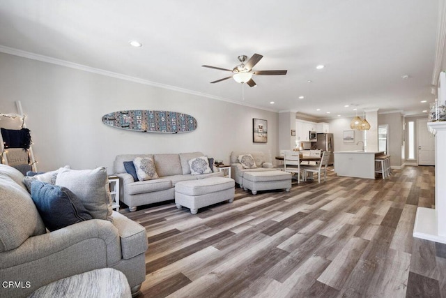 1503 Windshore Way, Oxnard, CA 93035 - living area with a ceiling fan, recessed lighting, wood finished floors, and ornamental molding
