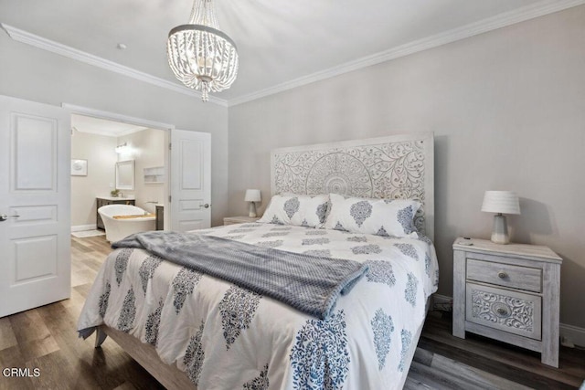 1503 Windshore Way, Oxnard, CA 93035 - bedroom featuring wood finished floors, a chandelier, ornamental molding, connected bathroom, and baseboards