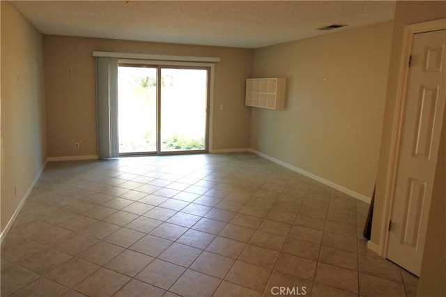 245 Doverfield Dr Unit 46, Placentia, CA 92870 - unfurnished room featuring light tile patterned floors and baseboards