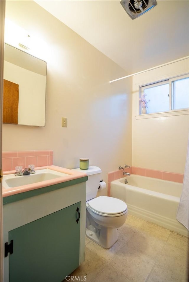 10655 Banner Lava Cap Rd, Nevada City, CA 95959 - bathroom featuring vanity, toilet, and shower / washtub combination