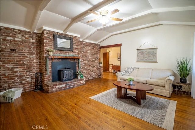 10655 Banner Lava Cap Rd, Nevada City, CA 95959 - living room featuring a wood stove, lofted ceiling, ceiling fan, and wood finished floors