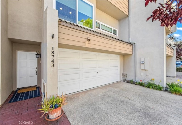 18743 Club Ln, Huntington Beach, CA 92648 - garage featuring driveway