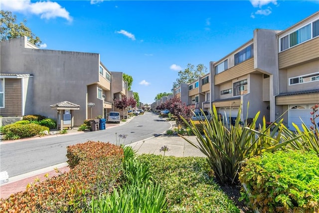 18743 Club Ln, Huntington Beach, CA 92648 - view of asphalt street with a residential view