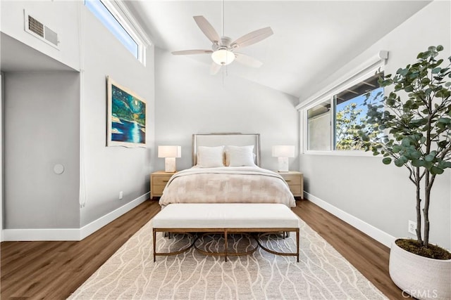 18743 Club Ln, Huntington Beach, CA 92648 - bedroom with baseboards, vaulted ceiling, wood finished floors, and a ceiling fan