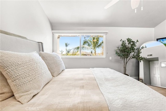 18743 Club Ln, Huntington Beach, CA 92648 - bedroom featuring wood finished floors, a ceiling fan, and vaulted ceiling