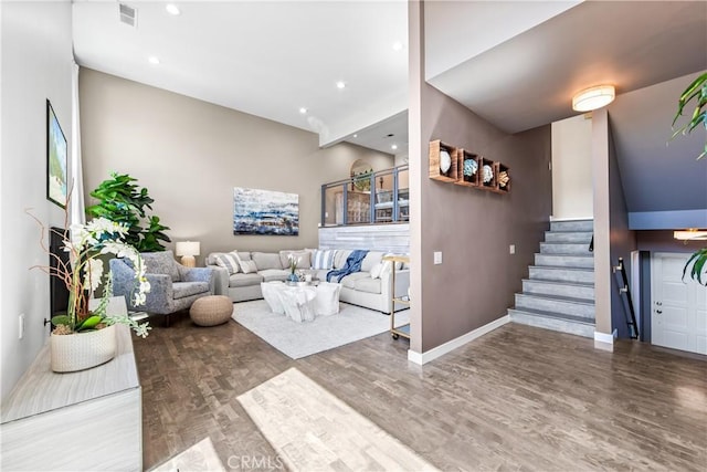 18743 Club Ln, Huntington Beach, CA 92648 - living area featuring wood finished floors, stairway, baseboards, and recessed lighting