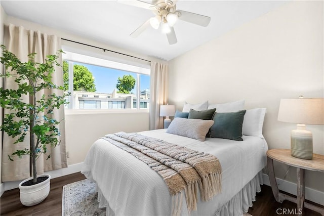 18743 Club Ln, Huntington Beach, CA 92648 - bedroom with wood finished floors, baseboards, and ceiling fan