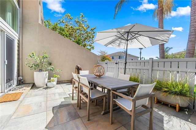 18743 Club Ln, Huntington Beach, CA 92648 - fenced backyard with a patio and outdoor dining area