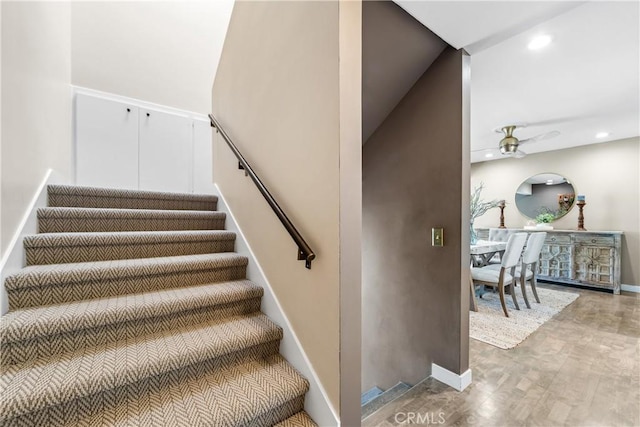 18743 Club Ln, Huntington Beach, CA 92648 - stairway featuring a ceiling fan, baseboards, and recessed lighting
