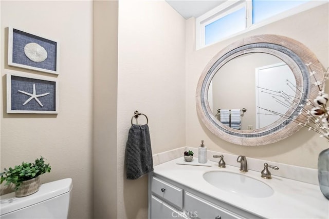 18743 Club Ln, Huntington Beach, CA 92648 - bathroom with toilet and vanity