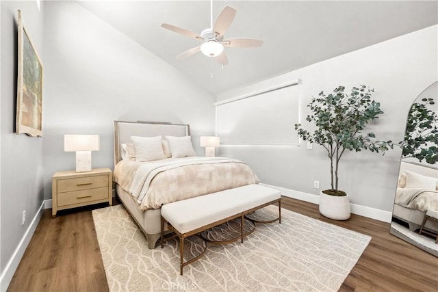 18743 Club Ln, Huntington Beach, CA 92648 - bedroom with baseboards, wood finished floors, vaulted ceiling, and ceiling fan