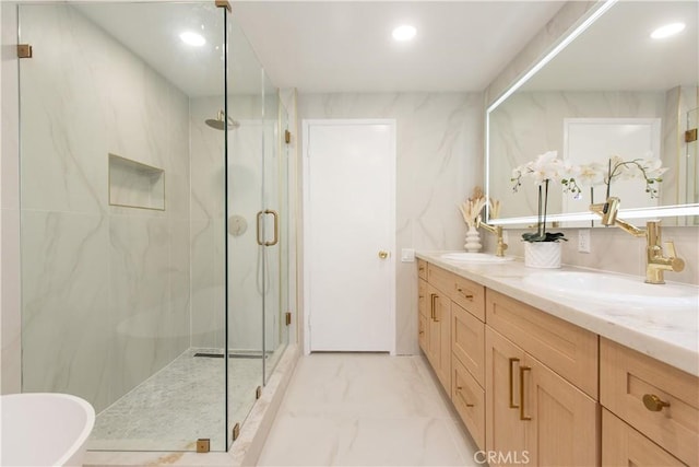 14879 Jadestone Dr, Sherman Oaks, CA 91403 - bathroom featuring a marble finish shower, double vanity, marble look tile flooring, and recessed lighting