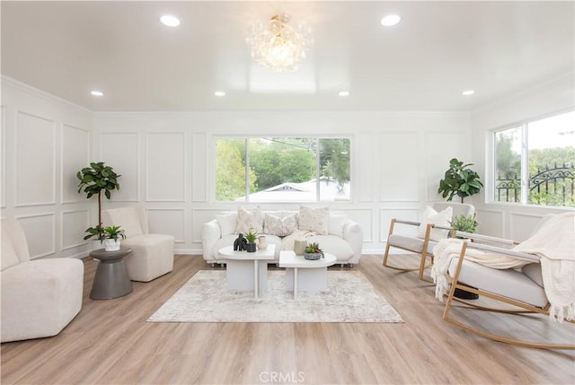 14879 Jadestone Dr, Sherman Oaks, CA 91403 - living room with a decorative wall, plenty of natural light, crown molding, a chandelier, and recessed lighting
