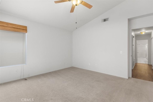28265 Valombrosa Dr, Menifee, CA 92584 - unfurnished room featuring vaulted ceiling, carpet, a ceiling fan, and attic access