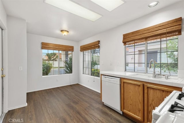 28265 Valombrosa Dr, Menifee, CA 92584 - kitchen with white appliances, tile counters, a sink, dark wood-style flooring, and baseboards