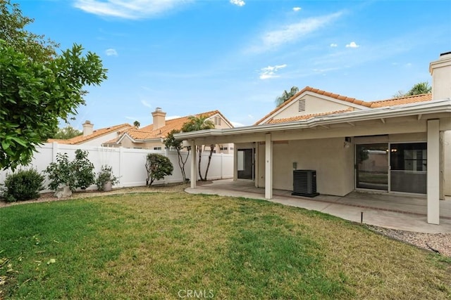 28265 Valombrosa Dr, Menifee, CA 92584 - rear view of property featuring stucco siding, central AC unit, a patio, a chimney, and a tile roof