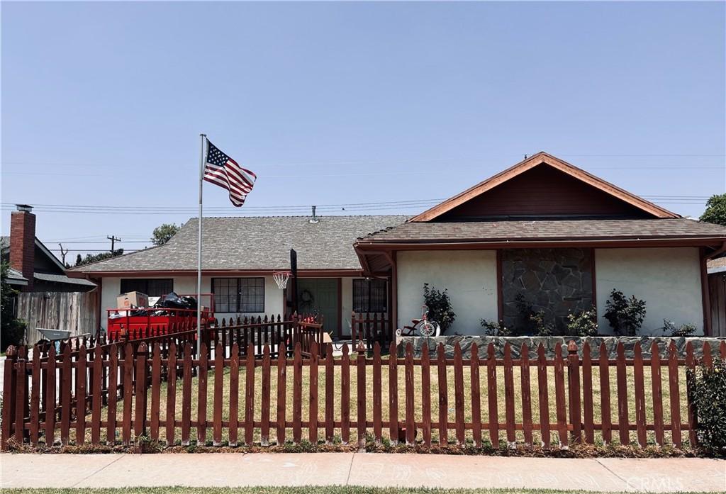 805 Vinemead Dr, Whittier, CA 90601 - ranch-style house with a fenced front yard, stucco siding, and a shingled roof