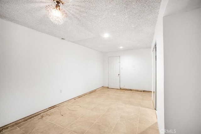 44128 Stanridge Ave, Lancaster, CA 93535 - empty room featuring a textured ceiling and recessed lighting