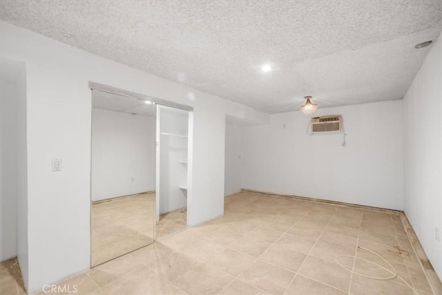 44128 Stanridge Ave, Lancaster, CA 93535 - unfurnished bedroom with a textured ceiling and a closet
