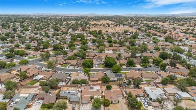 44128 Stanridge Ave, Lancaster, CA 93535 - aerial view of residential area featuring a mountainous background