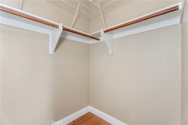 18762 Pimlico, Yorba Linda, CA 92886 - walk in closet featuring wood finished floors