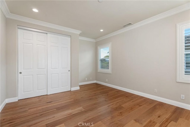18762 Pimlico, Yorba Linda, CA 92886 - unfurnished bedroom with light wood-style floors, baseboards, ornamental molding, recessed lighting, and a closet