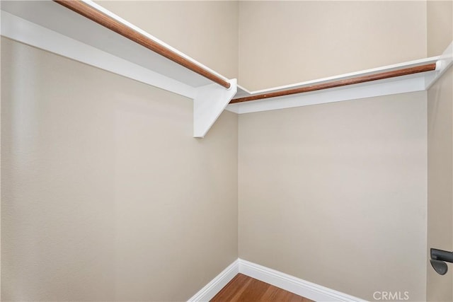 18762 Pimlico, Yorba Linda, CA 92886 - walk in closet featuring wood finished floors
