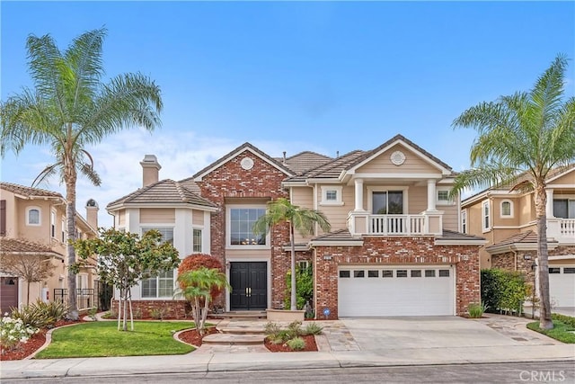 18762 Pimlico, Yorba Linda, CA 92886 - view of front of home featuring driveway, an attached garage, and brick siding