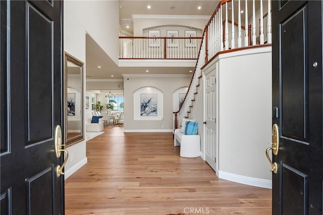 18762 Pimlico, Yorba Linda, CA 92886 - foyer featuring ornamental molding, stairs, a high ceiling, light wood-type flooring, and baseboards