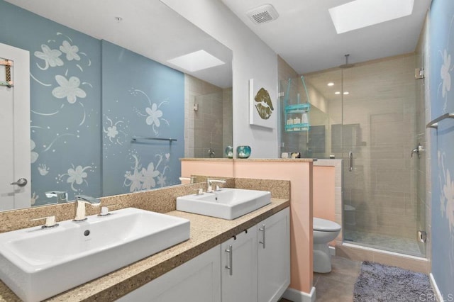 5441 Pennsylvania Ln, La Mesa, CA 91942 - full bathroom with a skylight, a stall shower, double vanity, and toilet