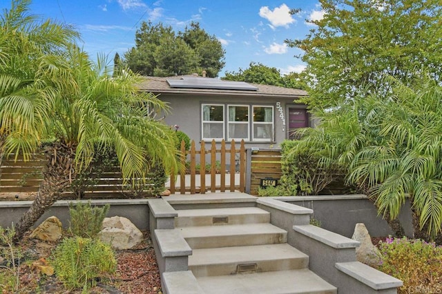 5441 Pennsylvania Ln, La Mesa, CA 91942 - view of front of home with solar panels and stucco siding