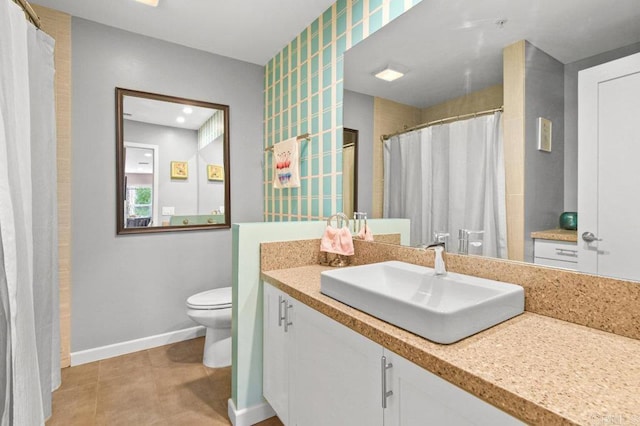 5441 Pennsylvania Ln, La Mesa, CA 91942 - bathroom with toilet, vanity, baseboards, and a shower with curtain
