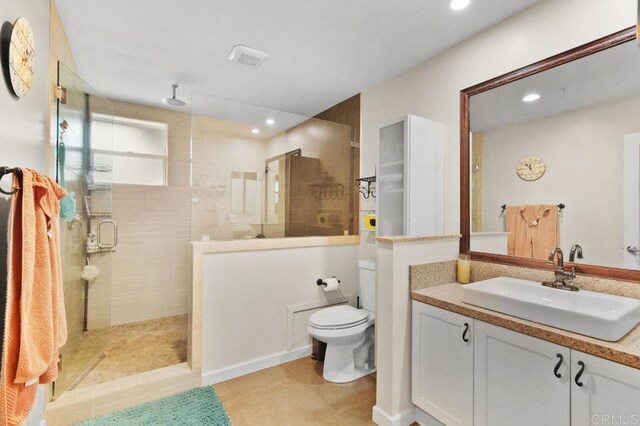5441 Pennsylvania Ln, La Mesa, CA 91942 - full bath with a stall shower, vanity, toilet, recessed lighting, and tile patterned flooring