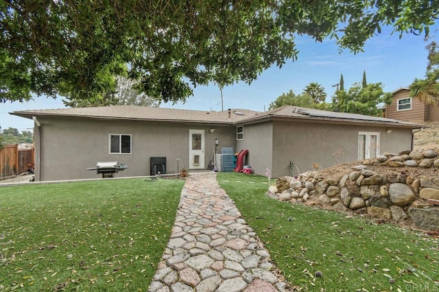 5441 Pennsylvania Ln, La Mesa, CA 91942 - back of property featuring stucco siding and roof mounted solar panels