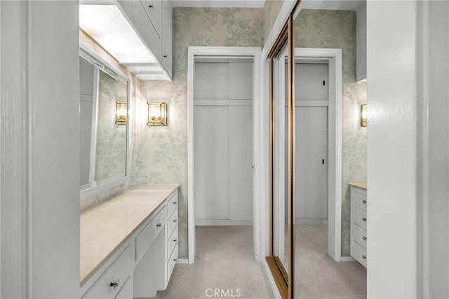 2208 Thorley Pl, Palos Verdes Estates, CA 90274 - bathroom with wallpapered walls, vanity, and baseboards