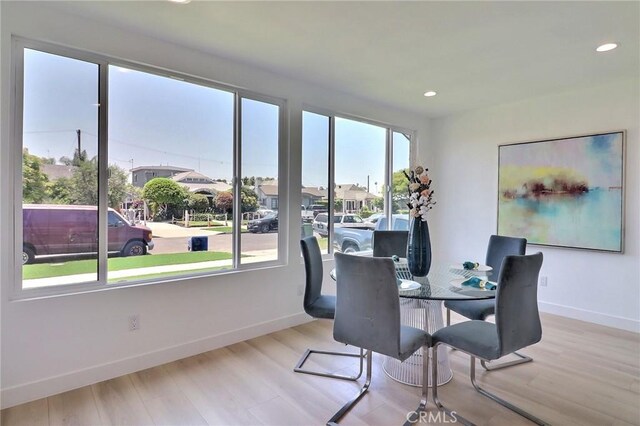 2015 W 42nd Pl, Los Angeles, CA 90062 - dining room with baseboards, wood finished floors, and recessed lighting