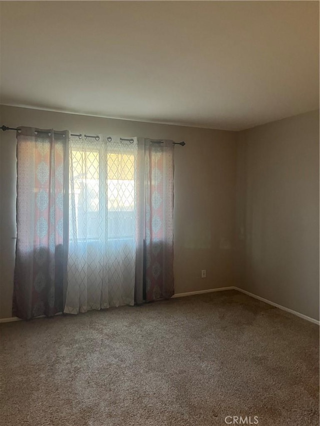 19167 Parkland St Unit 136, Yorba Linda, CA 92886 - carpeted spare room featuring baseboards
