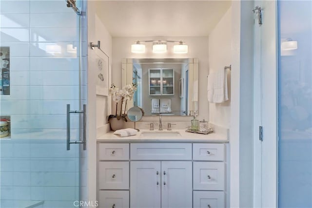 3521 Bahia Blanca W Unit C, Laguna Woods, CA 92637 - bathroom with vanity and a stall shower