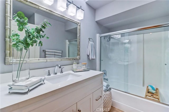 3521 Bahia Blanca W Unit C, Laguna Woods, CA 92637 - full bathroom featuring vanity and combined bath / shower with glass door