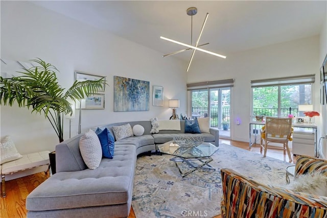 3521 Bahia Blanca W Unit C, Laguna Woods, CA 92637 - living room with wood finished floors and a high ceiling