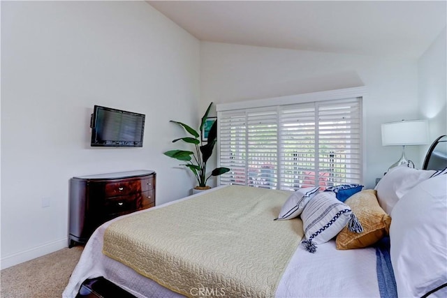 3521 Bahia Blanca W Unit C, Laguna Woods, CA 92637 - carpeted bedroom featuring lofted ceiling and baseboards