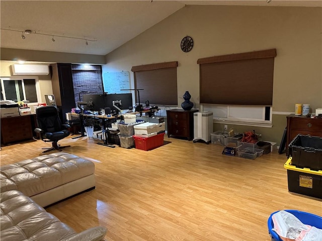 1808 Via Entrada, Rowland Heights, CA 91748 - living area with wood finished floors, an AC wall unit, a desk, lofted ceiling, and track lighting