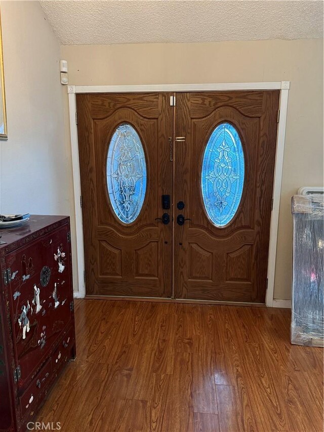 1808 Via Entrada, Rowland Heights, CA 91748 - entrance foyer featuring wood finished floors and a textured ceiling