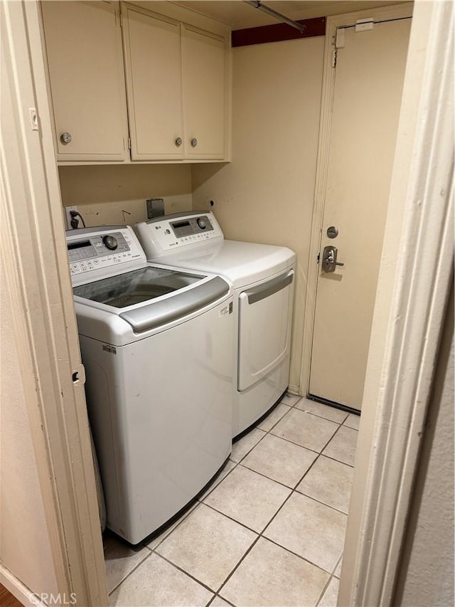 1808 Via Entrada, Rowland Heights, CA 91748 - laundry room with washing machine and clothes dryer, cabinet space, and light tile patterned floors
