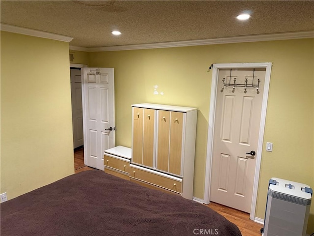 1808 Via Entrada, Rowland Heights, CA 91748 - unfurnished bedroom with crown molding, wood finished floors, recessed lighting, a textured ceiling, and baseboards