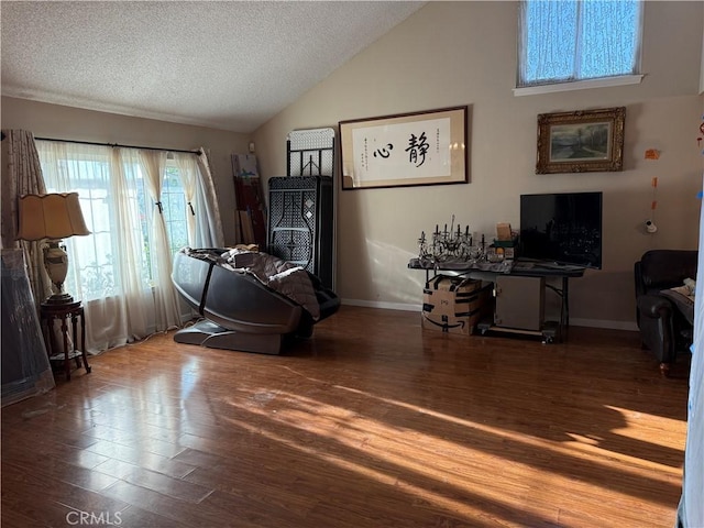 1808 Via Entrada, Rowland Heights, CA 91748 - living room with lofted ceiling, wood finished floors, a textured ceiling, and baseboards