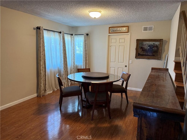 1808 Via Entrada, Rowland Heights, CA 91748 - dining room with a textured ceiling, dark wood-style flooring, baseboards, and stairway