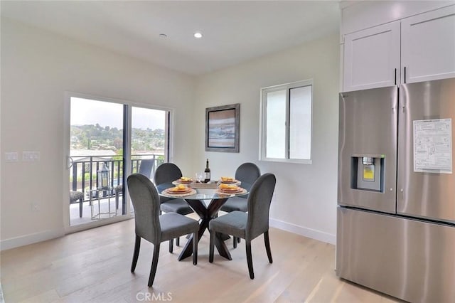 4850 Buchanan, Los Angeles, CA 90042 - dining area featuring baseboards, light wood-style flooring, and recessed lighting