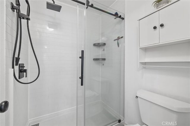 62 Wild Horse Loop Unit 29, Rancho Santa Margarita, CA 92688 - full bathroom featuring toilet and a shower stall