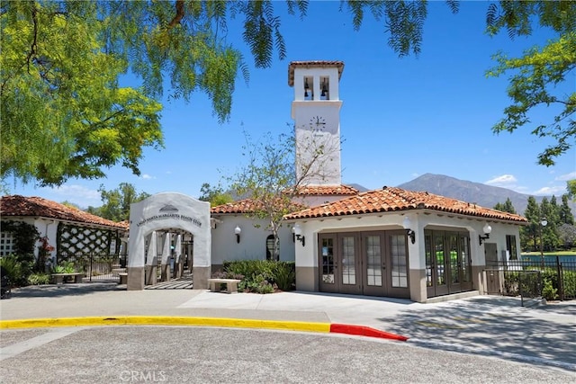 62 Wild Horse Loop Unit 29, Rancho Santa Margarita, CA 92688 - view of building exterior with a mountain view